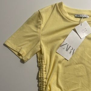 Never been worn light yellow Zara size small top!